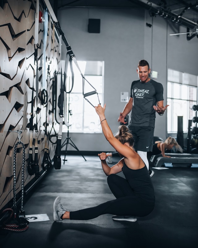 1 on 1 personal training showing how to use resistance bands
